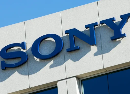 A split image showing a film reel looking down and musical notes soaring up, representing Sony's mixed quarter results.