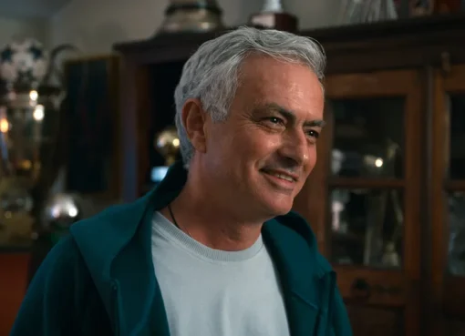 Jose Mourinho smiling amidst his personal trophy collection in the Netflix documentary teaser.