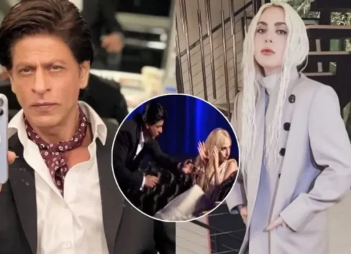 Shah Rukh Khan on stage offering a watch to Lady Gaga.
