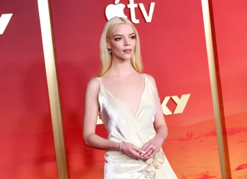 Close-up of Anya Taylor-Joy smiling slightly.