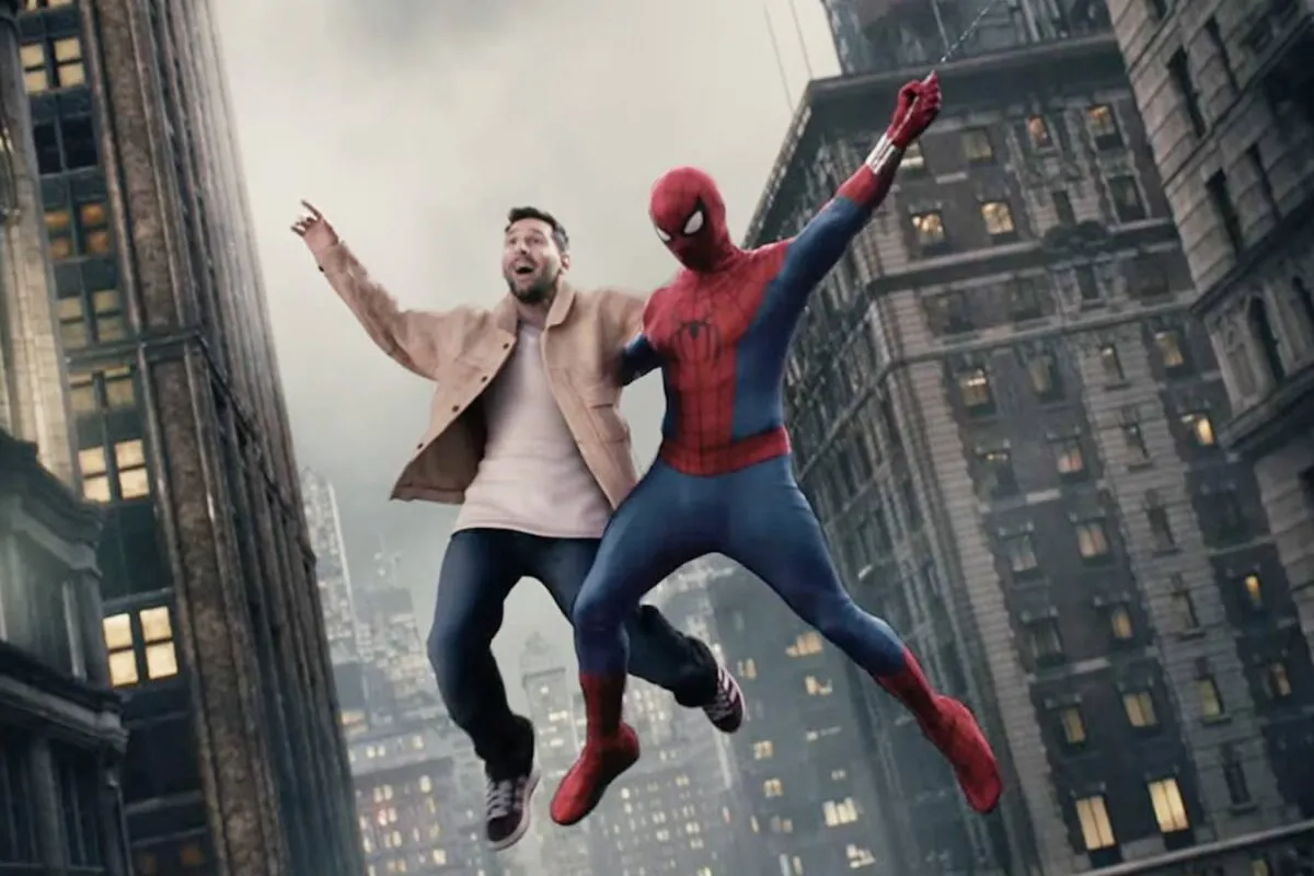 Lionel Messi smiling next to Tom Holland dressed as Spider-Man in a playful movie promo.