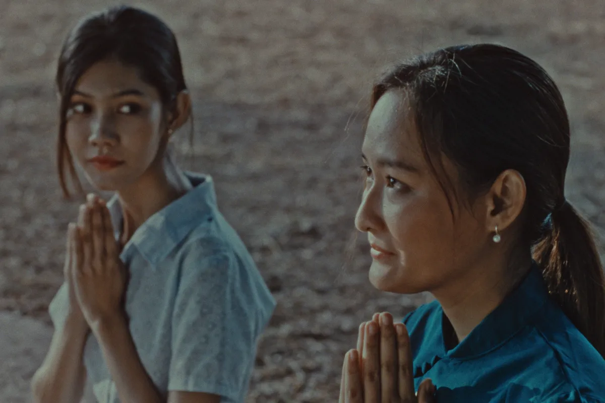 Still from the film 'Fruit Gathering' showing two women, hinting at their deep, unique connection.
