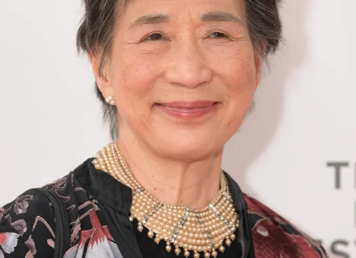 Portrait of Wai Ching Ho, looking calmly serious.