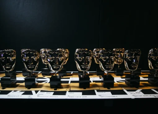 A golden BAFTA award statuette.