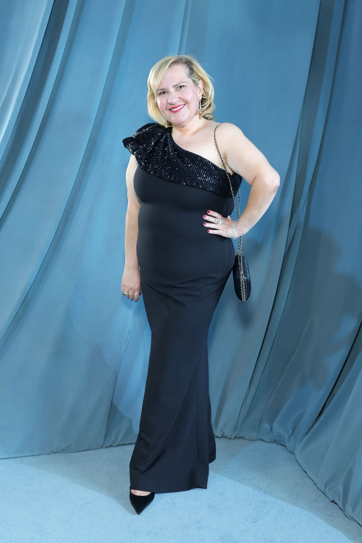 Teni Melidonian smiling at an awards show.