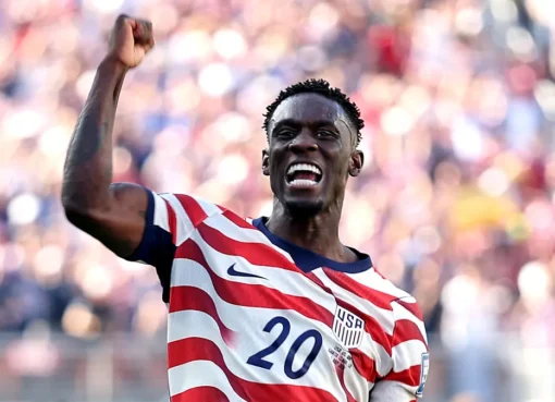 A graphic showing the USMNT logo next to the Belgian flag with a soccer ball.