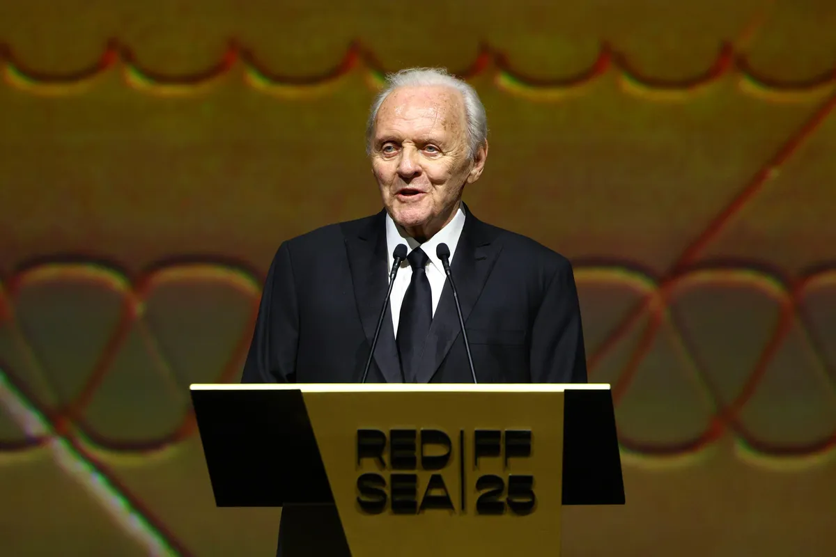 A dignified portrait of actor Anthony Hopkins looking thoughtful.