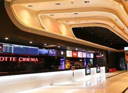 A split image showing Lotte Cinema and Megabox logos, looking like they are moving away from each other.