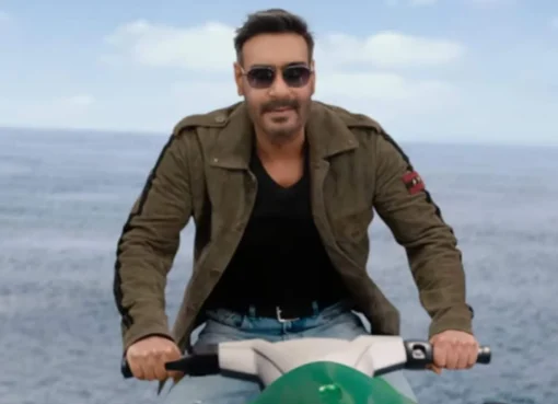 A movie poster for Dhamaal 4 featuring Ajay Devgn and other actors.