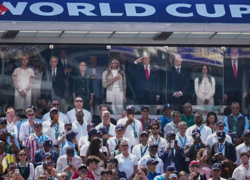 Donald Trump watching the World Cup Final from a stadium box.