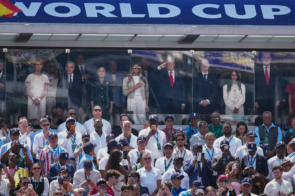 Donald Trump watching the World Cup Final from a stadium box.