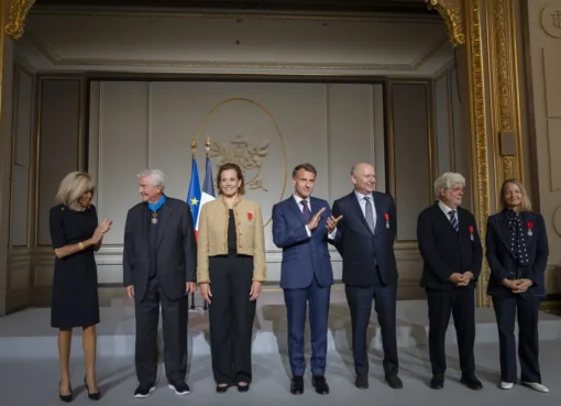French President Emmanuel Macron honoring Chris Meledandri, George Lucas, Jodie Foster, and Sigourney Weaver with the Legion of Honor at the Élysée Palace.