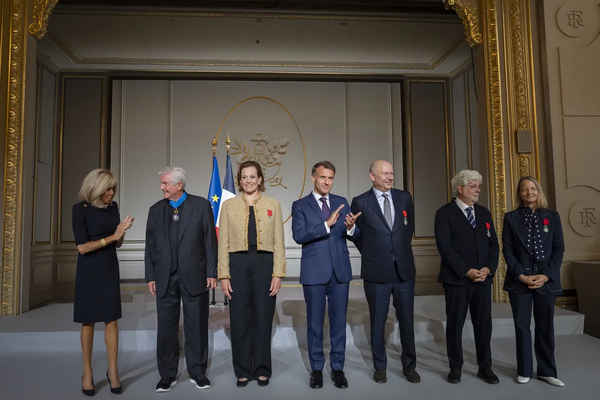 French President Emmanuel Macron honoring Chris Meledandri, George Lucas, Jodie Foster, and Sigourney Weaver with the Legion of Honor at the Élysée Palace.
