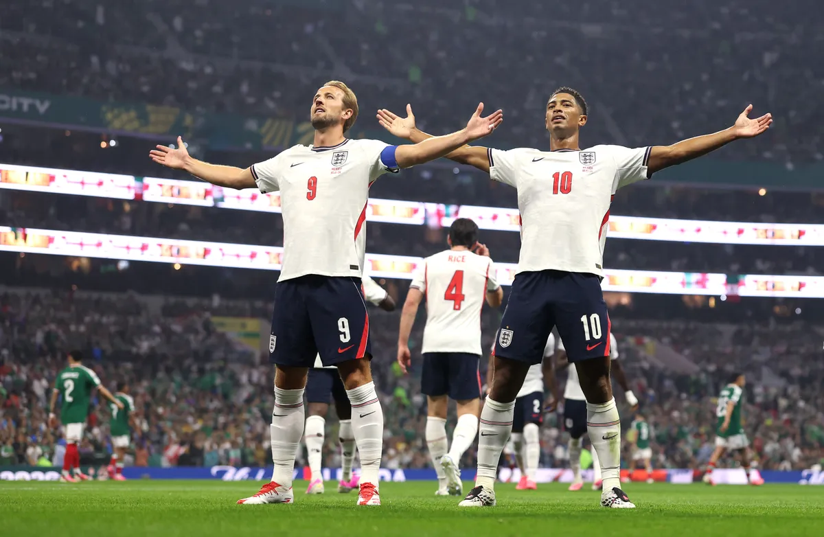 Soccer players celebrating a goal during a match.