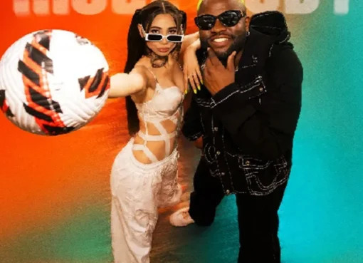 Zahrah Khan, Skales, and Sanjoy together, smiling and looking energetic, with a subtle football theme in the background.