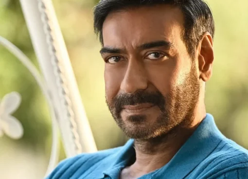 Ajay Devgn smiling in a Vimal Elaichi advertisement.