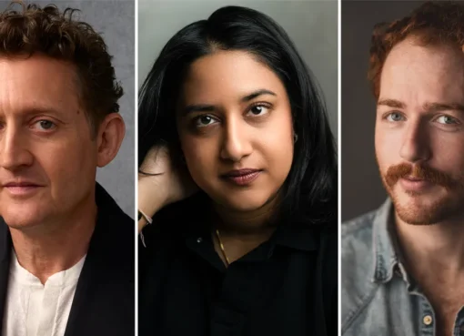 Alex Winter smiling and looking directly at the camera.
