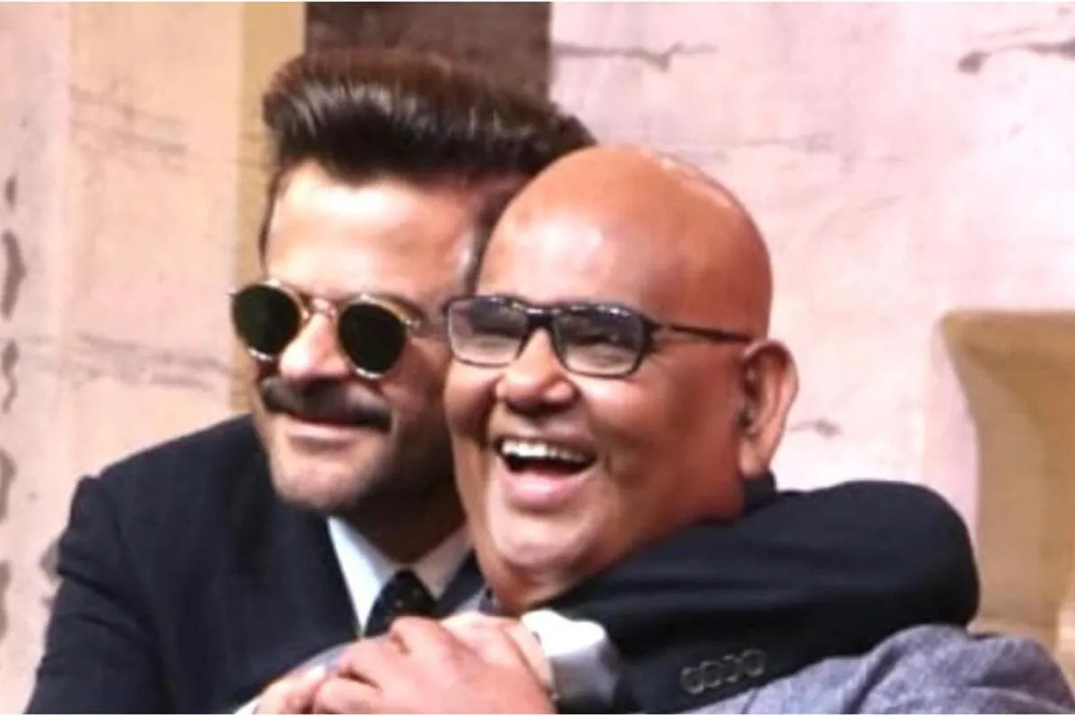 Anil Kapoor and Satish Kaushik smiling together in a warm, friendly photo.