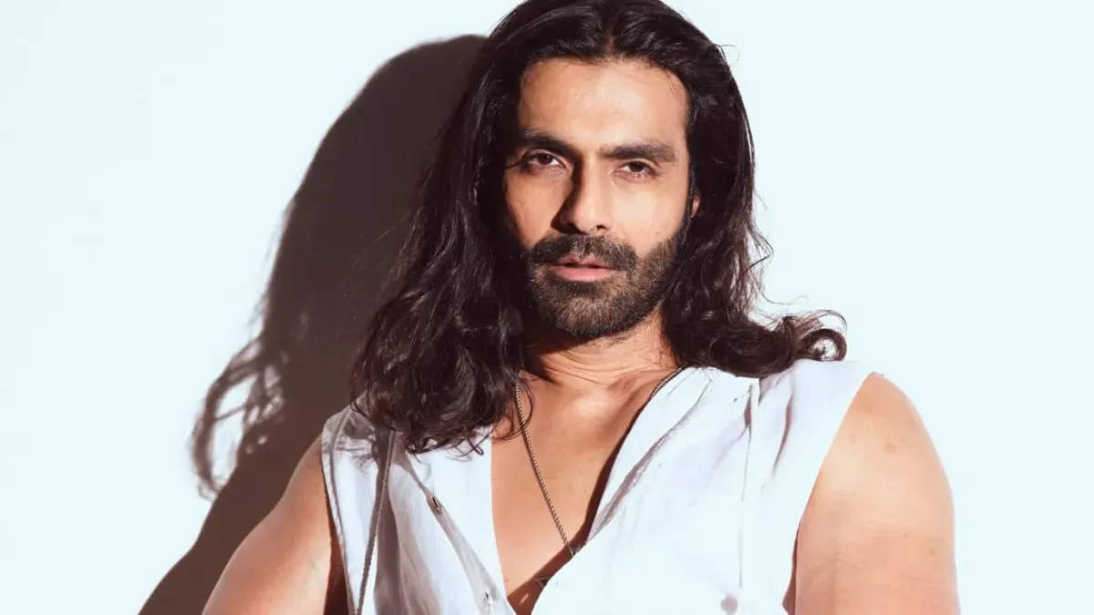 Actor Ashmit Patel speaking passionately.