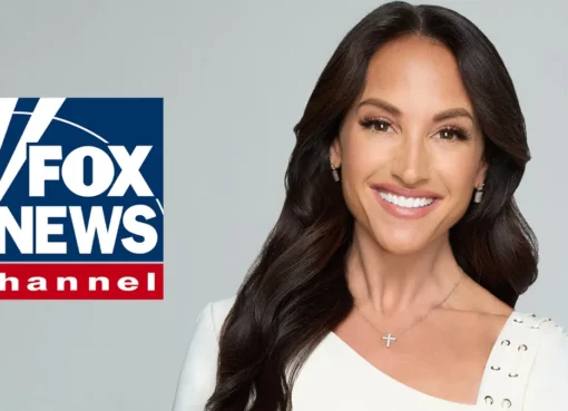 Emily Compagno smiling on a news set.