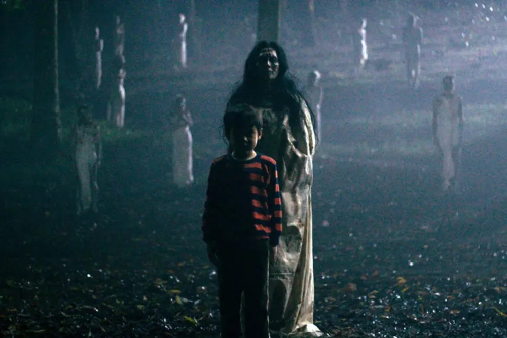 A dark, moody image suggesting a horror film, perhaps with a shadowed figure or an unsettling interior.