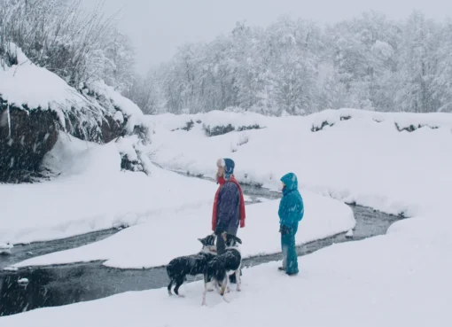 A promotional still from 'The Meltdown' showing a mysterious scene in a snowy Andes ski resort.