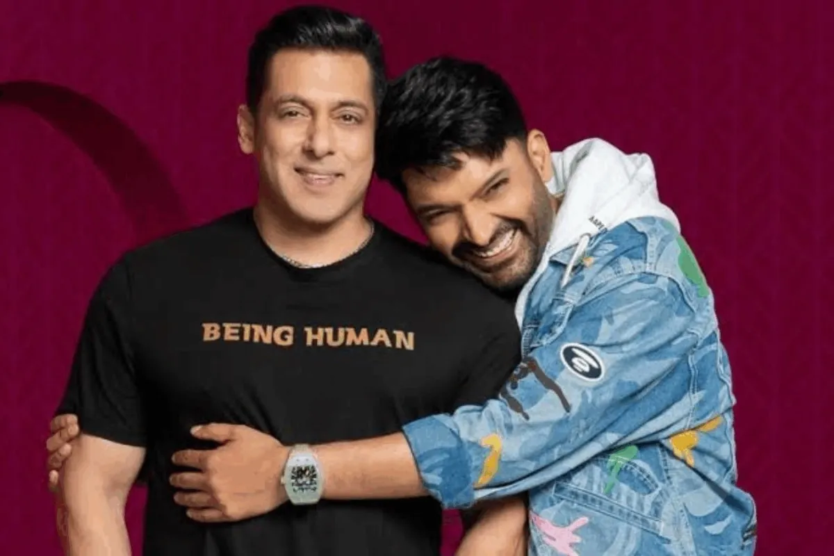 Kapil Sharma and Salman Khan on a talk show set.