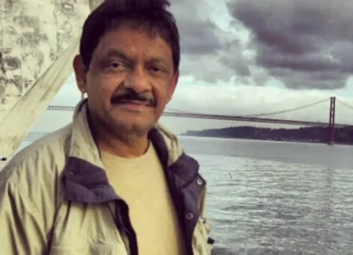 Photo of director Shakeel Noorani looking serious.