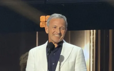 Bob Iger being presented with a Disney Legend award.