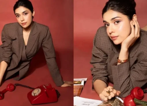 Eisha Singh in a retro outfit with bold makeup.