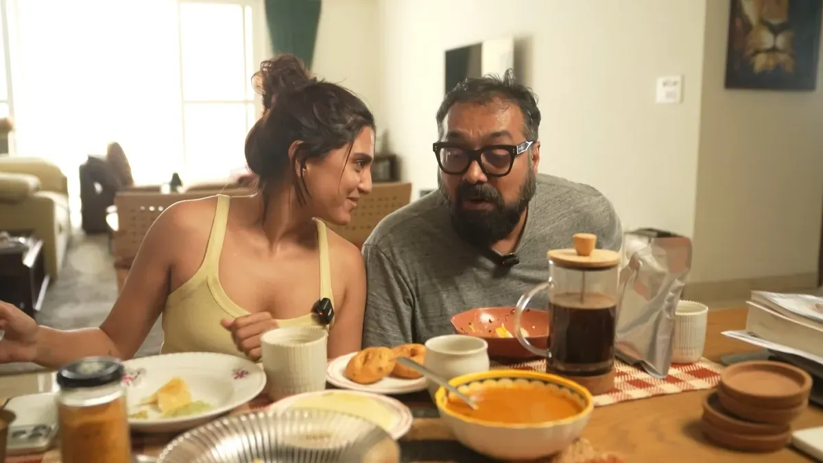 Anurag Kashyap and Shubhra Shetty smiling together at an event.