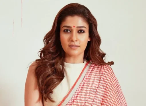 Nayanthara smiling elegantly, looking confident.