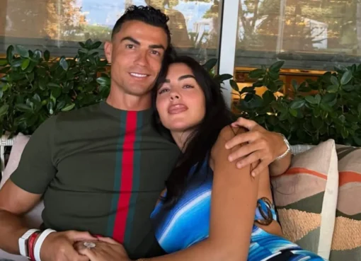 Georgina Rodriguez and Cristiano Ronaldo smiling together.