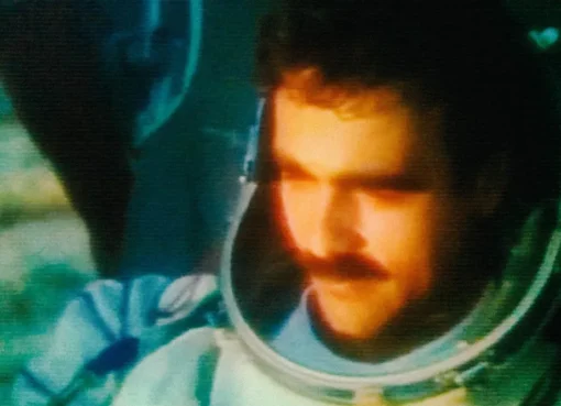 Illustration of a lone astronaut floating in space, likely a still or concept art from 'Forgotten Spaceman'.