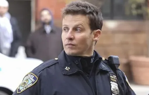 Donnie Wahlberg and Will Estes pose for a photo on the set of Boston Blue.
