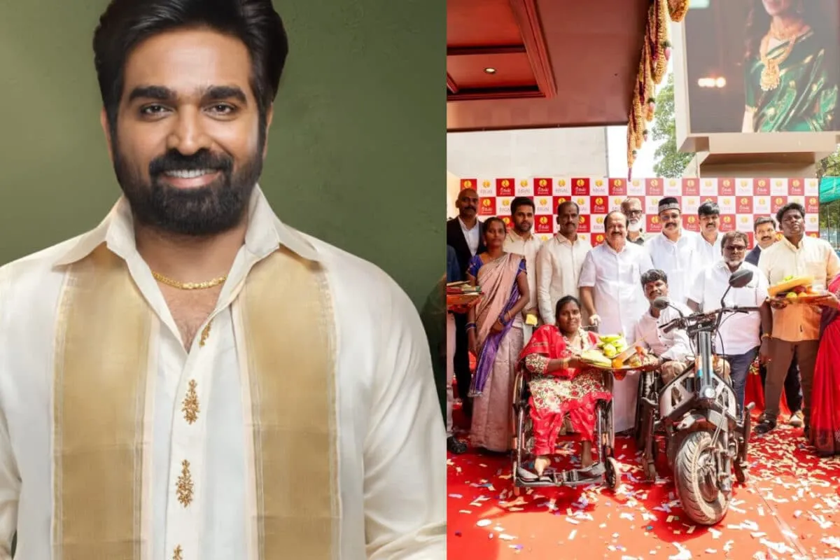 Vijay Sethupathi and Simran smiling, wearing traditional outfits and jewelry.