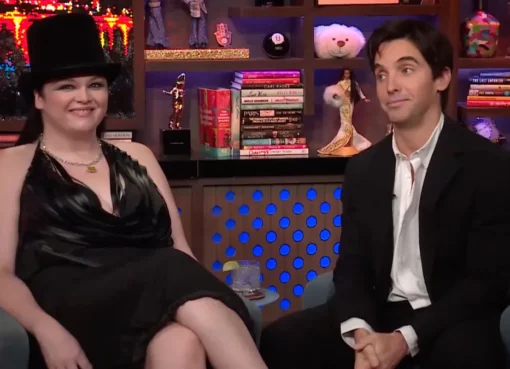 Paul W. Downs smiling on a talk show.