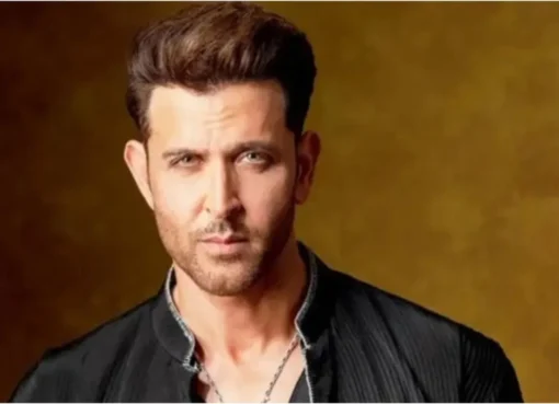 Hrithik Roshan looking thoughtful, perhaps looking at a phone screen with social media trends.