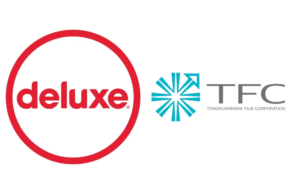 Illustration showing two company logos, Deluxe Media and Tohokushinsha Film Corporation, merging with a stylized map of the Asia-Pacific region in the background.