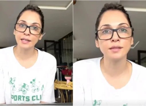 Isha Koppikar speaking passionately in a video clip with warm lighting