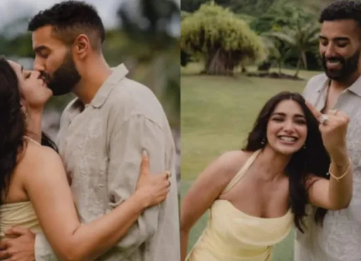 Jiya Shankar and her fiancé Kaaran kissing in a garden overlooking the ocean