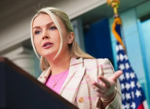 Karoline Leavitt speaking at a press conference
