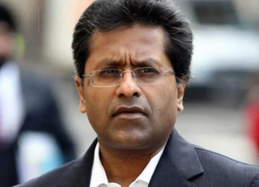 A picture of Lalit Modi smiling, like he's about to spill some tea.