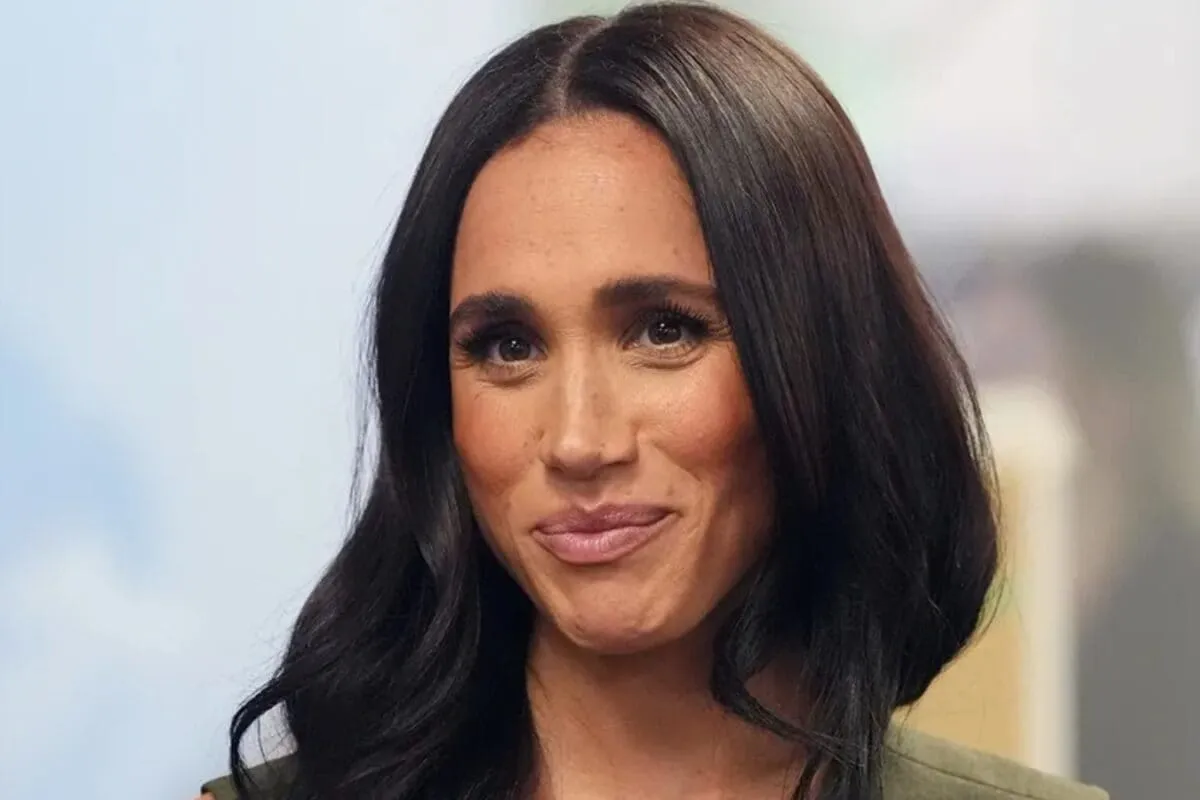 Photo of Meghan Markle looking thoughtful.