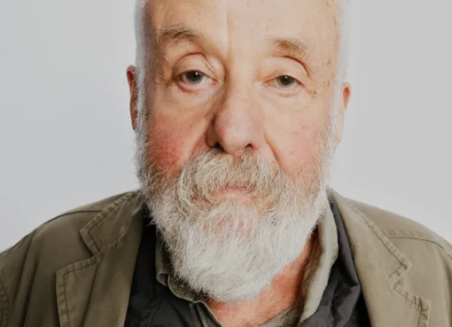 Veteran filmmaker Mike Leigh speaking.