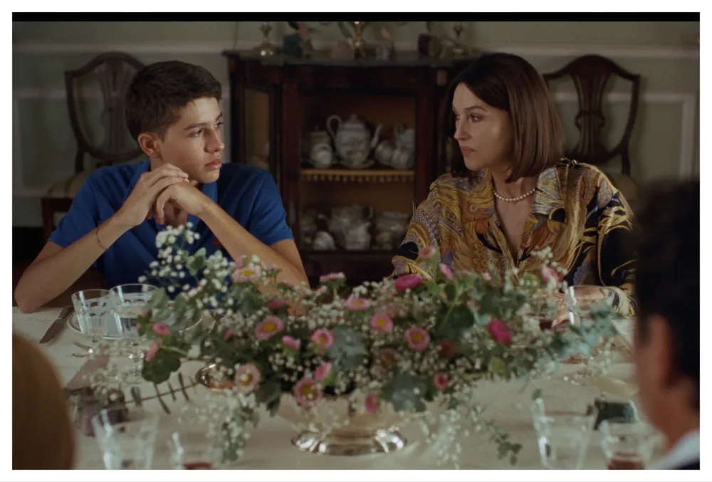 Monica Bellucci giving an iconic sneer in the movie 'Ketticè'.