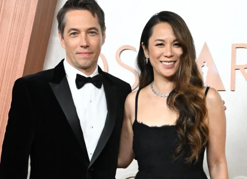 Sean Baker and Samantha Quan smiling together at an event.