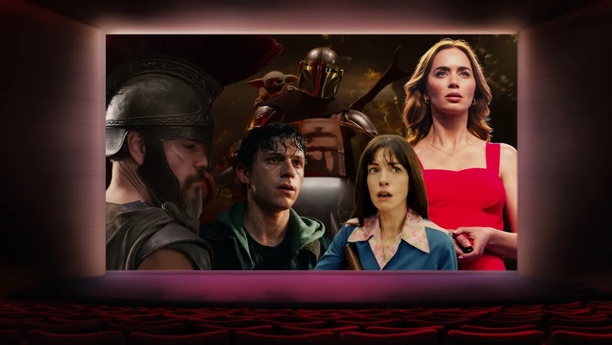 Movie theater marquee showing 'Summer Blockbusters' tickets available