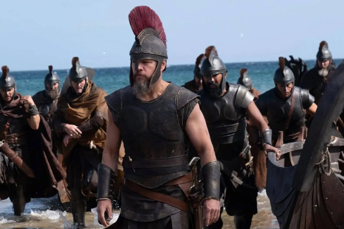 A movie poster for 'The Odyssey' showing epic scenes.