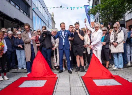 Anders Danielsen Lie and Anne Marie Ottersen smiling as they are inducted into the Haugesund Walk of Fame.